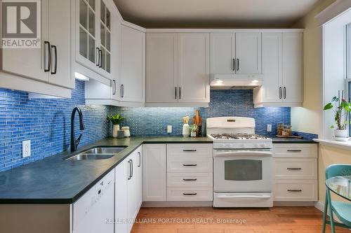 130 Sunnyside Avenue, Toronto, ON - Indoor Photo Showing Kitchen With Double Sink