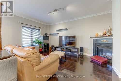 62 Warren Bradley Street, Markham, ON - Indoor Photo Showing Living Room With Fireplace