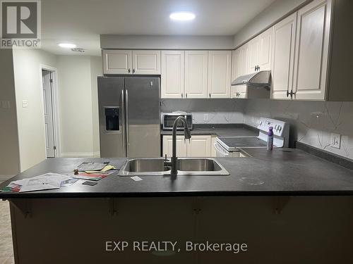 140 Windflower Drive, Kitchener, ON - Indoor Photo Showing Kitchen With Double Sink