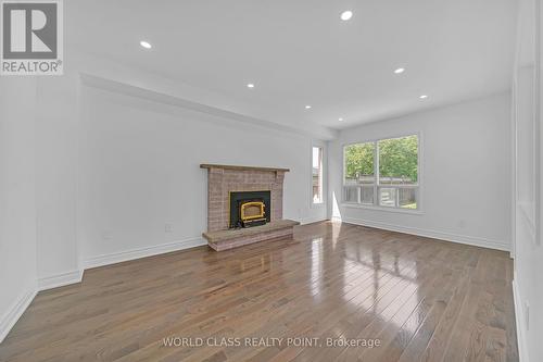 202 Bridgewater Avenue, Whitby, ON - Indoor Photo Showing Living Room With Fireplace