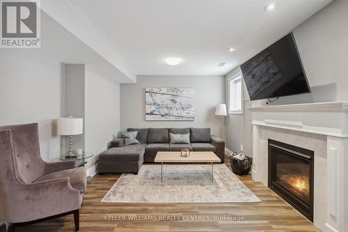 66 Robert Wilson Crescent, Georgina, ON - Indoor Photo Showing Living Room With Fireplace