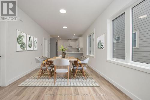 Dining area staged - 452 Woodman Avenue, London, ON - Indoor Photo Showing Dining Room