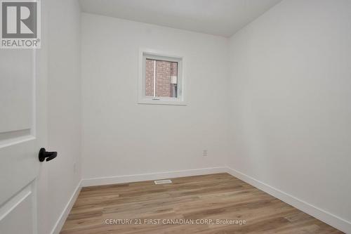 Main level bedroom 2 - 452 Woodman Avenue, London, ON - Indoor Photo Showing Other Room