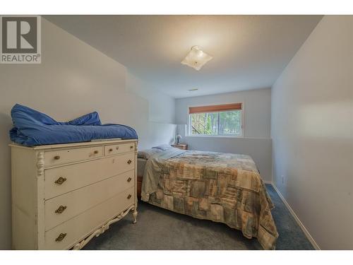 5208 Davis Road, 108 Mile Ranch, BC - Indoor Photo Showing Bedroom