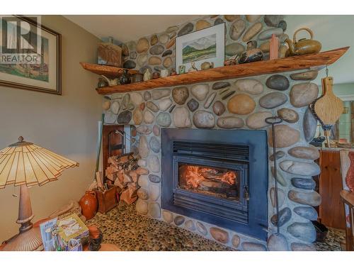 5208 Davis Road, 108 Mile Ranch, BC - Indoor With Fireplace