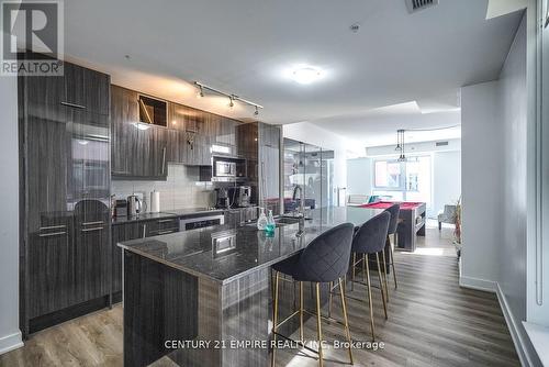 325 - 30 Nelson Street, Toronto, ON - Indoor Photo Showing Kitchen With Upgraded Kitchen