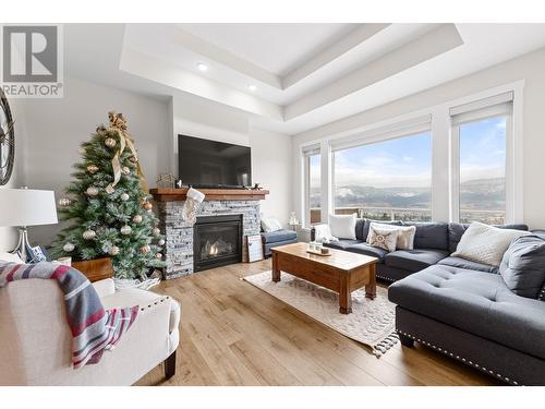 1107 Syer Road, Penticton, BC - Indoor Photo Showing Living Room With Fireplace