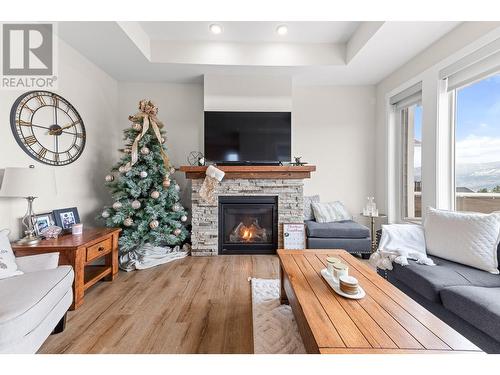 1107 Syer Road, Penticton, BC - Indoor Photo Showing Living Room With Fireplace