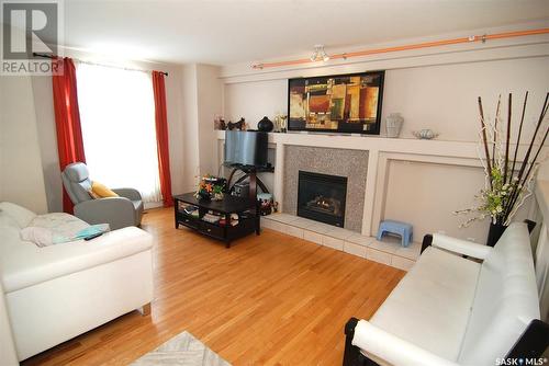 2915 37Th Street W, Saskatoon, SK - Indoor Photo Showing Living Room With Fireplace