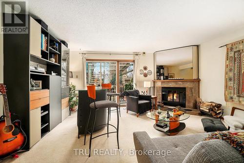 2308 Walsh Avenue, Ottawa, ON - Indoor Photo Showing Living Room With Fireplace