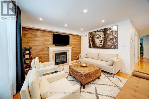 625 Autumnwood Trail, Oshawa, ON - Indoor Photo Showing Living Room With Fireplace