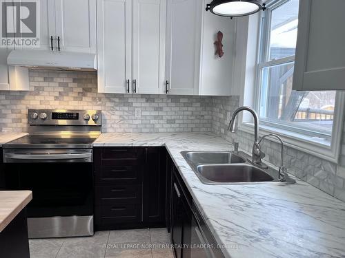 502 Remembrance Street, Timmins (Porcupine - West), ON - Indoor Photo Showing Kitchen With Double Sink With Upgraded Kitchen