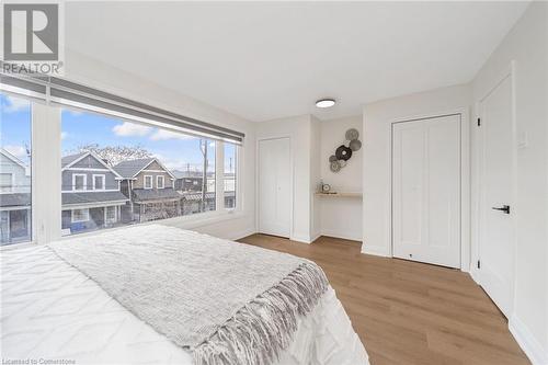 Bedroom with hardwood / wood-style flooring - 45 Munroe Street, Hamilton, ON - Indoor Photo Showing Bedroom