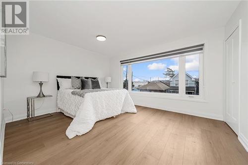 Bedroom with hardwood / wood-style floors - 45 Munroe Street, Hamilton, ON - Indoor Photo Showing Bedroom