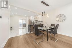 Dining area featuring light hardwood / wood-style flooring - 