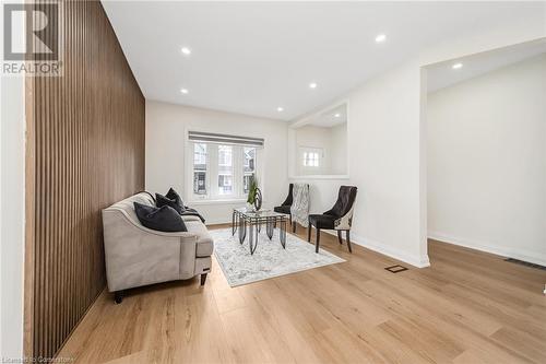 Living area featuring light hardwood / wood-style flooring - 45 Munroe Street, Hamilton, ON - Indoor