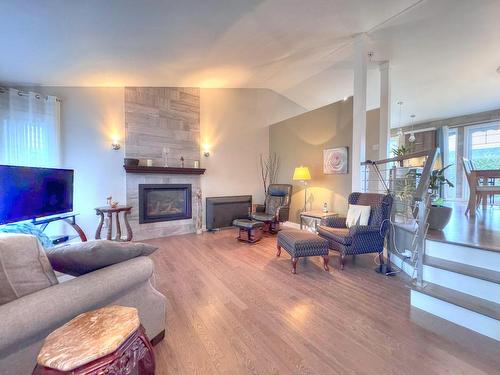 Salon - 991 Boul. Jacques-Degeay, L'Assomption, QC - Indoor Photo Showing Living Room With Fireplace