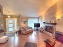 Salon - 991 Boul. Jacques-Degeay, L'Assomption, QC  - Indoor Photo Showing Living Room With Fireplace 