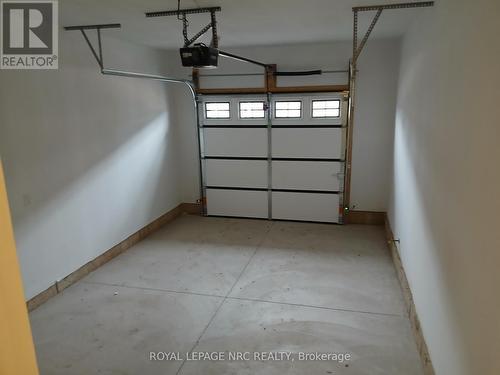 12-397 Garrison Road, Fort Erie (333 - Lakeshore), ON - Indoor Photo Showing Garage