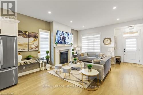 3585 Canfield Crescent, Fort Erie (327 - Black Creek), ON - Indoor Photo Showing Living Room With Fireplace