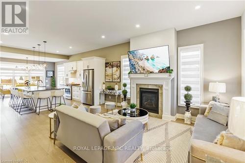 3585 Canfield Crescent, Fort Erie (327 - Black Creek), ON - Indoor Photo Showing Living Room With Fireplace