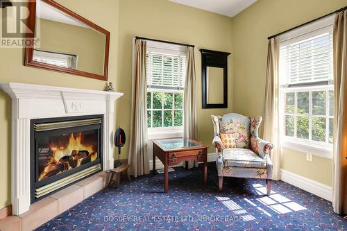 619 King Street, Niagara-On-The-Lake (101 - Town), ON - Indoor Photo Showing Other Room With Fireplace