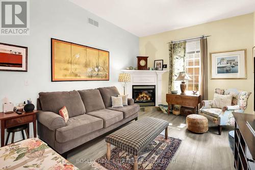 619 King Street, Niagara-On-The-Lake (101 - Town), ON - Indoor Photo Showing Living Room With Fireplace