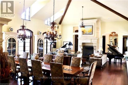 10131 Niagara River Parkway, Niagara Falls (224 - Lyons Creek), ON - Indoor Photo Showing Dining Room With Fireplace