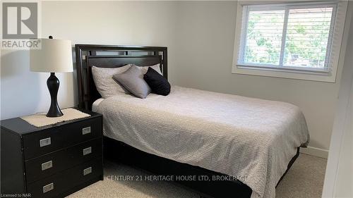 125 - 185 Denistoun Street, Welland (772 - Broadway), ON - Indoor Photo Showing Bedroom