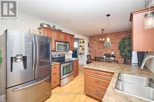 144 River Road, Welland (768 - Welland Downtown), ON - Indoor Photo Showing Kitchen With Double Sink