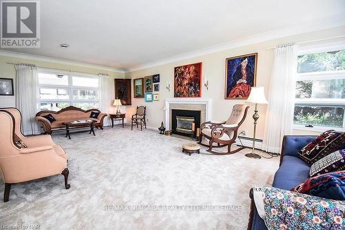 1457 Niagara Boulevard, Fort Erie (332 - Central), ON - Indoor Photo Showing Living Room With Fireplace