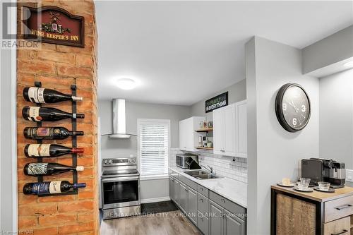 15 Jones Street, St. Catharines (451 - Downtown), ON - Indoor Photo Showing Kitchen With Double Sink