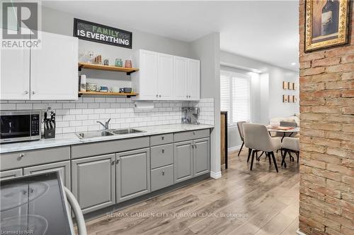 15 Jones Street, St. Catharines (451 - Downtown), ON - Indoor Photo Showing Kitchen With Double Sink