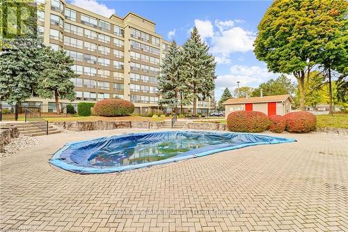 303 - 5100 Dorchester Road, Niagara Falls (212 - Morrison), ON - Outdoor With In Ground Pool