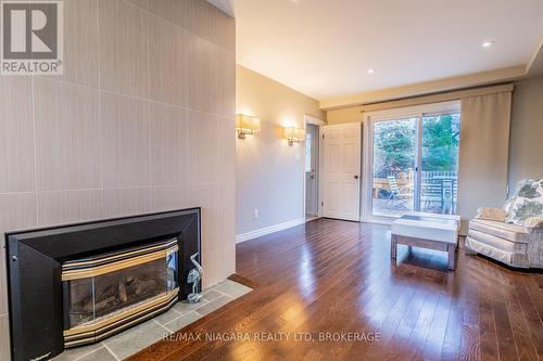 4 Mississauga Road, St. Catharines (437 - Lakeshore), ON - Indoor Photo Showing Living Room With Fireplace