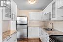 505 - 365 Geneva Street, St. Catharines (446 - Fairview), ON  - Indoor Photo Showing Kitchen With Stainless Steel Kitchen With Double Sink 