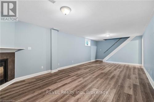 67 Virginia Street, Welland (769 - Prince Charles), ON - Indoor Photo Showing Other Room With Fireplace