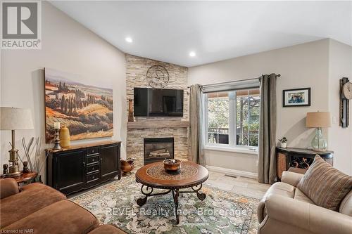 67 Virginia Street, Welland (769 - Prince Charles), ON - Indoor Photo Showing Living Room With Fireplace