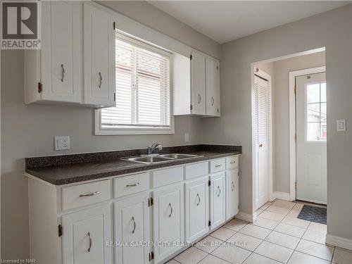 9 Churchill Street, St. Catharines (458 - Western Hill), ON - Indoor Photo Showing Kitchen With Double Sink