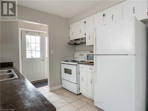 9 Churchill Street, St. Catharines (458 - Western Hill), ON - Indoor Photo Showing Kitchen With Double Sink