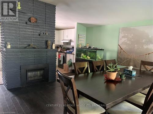 67 Wakelin Terrace, St. Catharines (444 - Carlton/Bunting), ON - Indoor Photo Showing Dining Room With Fireplace