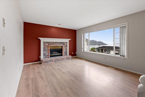 6133 Aitkens Road, Peachland, BC - Indoor Photo Showing Living Room With Fireplace