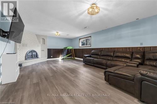 9 Orlando Drive, St. Catharines (443 - Lakeport), ON - Indoor Photo Showing Living Room With Fireplace