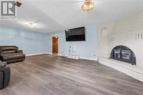 9 Orlando Drive, St. Catharines (443 - Lakeport), ON - Indoor Photo Showing Living Room With Fireplace