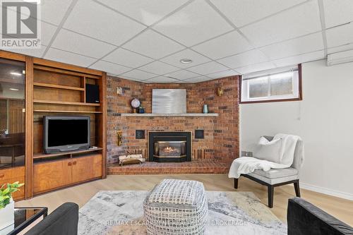 12 Broderick Avenue, Thorold (557 - Thorold Downtown), ON - Indoor Photo Showing Living Room With Fireplace