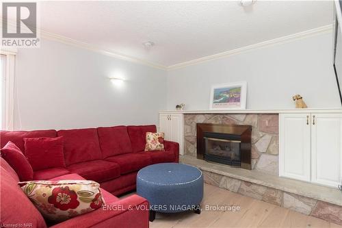 22 Port Master Drive, St. Catharines (439 - Martindale Pond), ON - Indoor Photo Showing Living Room With Fireplace