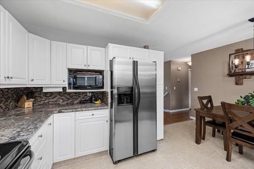 7-4450 Postill Drive, Kelowna, BC - Indoor Photo Showing Kitchen With Upgraded Kitchen