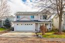 7-4450 Postill Drive, Kelowna, BC  - Outdoor With Facade 