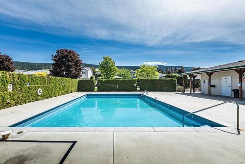 7-4450 Postill Drive, Kelowna, BC - Outdoor With In Ground Pool