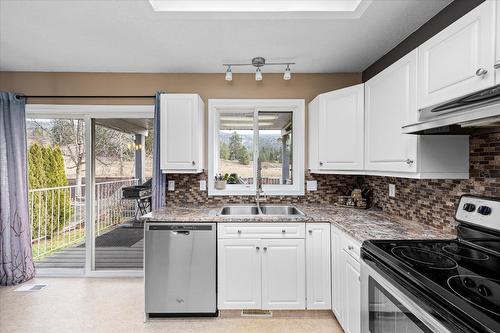 7-4450 Postill Drive, Kelowna, BC - Indoor Photo Showing Kitchen With Double Sink With Upgraded Kitchen